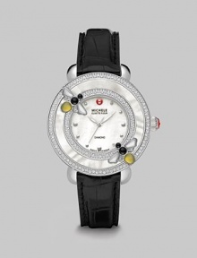 This limited edition timepiece boasts a diamond bezel with mother-of-pearl details on a luxurious alligator strap. Swiss quartz movementWater resistant to 5 ATMRound stainless steel case, 38mm (1.5)Diamond accented mother-of-pearl bezel, .57 tcwMother-of-pearl dialDot hour markersSecond hand Black alligator strap, 16mm wide (0.6)Imported