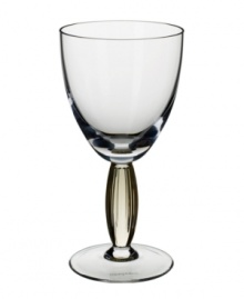 Bring contemporary refreshment to casual tables with the New Cottage claret wine glass. An amber-hued stem and fluted texture add interest to an already-stylish silhouette. From Villeroy & Boch.