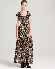 Bring a wild twist to your wardrobe with this Dolce Vita animal-print maxi dress, featuring buttons through the front and an elegant leather belt for a decidedly feminine silhouette.