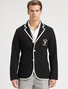 Preppy style meets luxurious comfort in this supremely lightweight cotton jersey blazer, finished with contrast piping and an embroidered crest for a heritage appeal.Button frontChest patch, waist flap pocketsRear ventAbout 29 from shoulder to hemCottonDry cleanImported