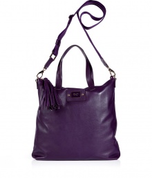 Elevate your everyday or off-duty look with this supple leather tote from cult-favorite accessory designer Anya Hindmarch - Large carryall shape, top zip closure with tassel detail, top carrying handles, convertible shoulder strap, small internal pockets, back zip pocket - Perfect for toting around your daily essentials, work, or stylish travel