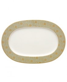 Perfect for casual dining or formal entertaining, this collection features a blend of gilded opulence and sophisticated style. Cheerful flower blossoms float gracefully across white bone china and gold and aqua filigree patterns as this lively set enhances your tabletop.