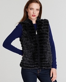 A luxurious knit rabbit fur vest adds a wow factor to any ensemble.