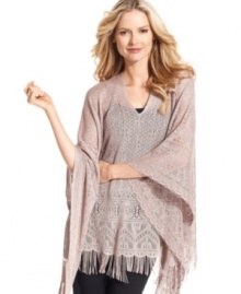 Channel your inner hippie-chic with this pretty poncho from Cejon. With its elegant macramé design and flirty fringe detailing, your look will be at once lady-like and laid-back.