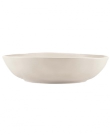 Find stylish versatility in the organic shape and matte-glazed finish of the large Casual Luxe serving bowl from Donna Karan by Lenox. Durable stoneware in a soft pearl hue is an ideal host for everyday meals and a natural go-to for entertaining.