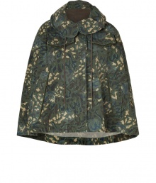 Take on the city streets in style in Marc by Marc Jacobs edgy camouflage cape - Olive round collar with drawstring, zip-away hood, flap pockets, hidden front closures - Loosely draped fit - Wear over favorite skinnies with edgy leather accessories and a chunky knit pullover