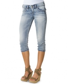 Closet-staple alert! Silver Jeans whips up a pair of denim capri shorts that are both versatile and cute thanks to the bleached light wash and embroidered back pockets!