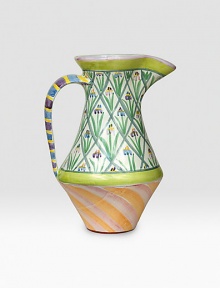 A verdant garden patio piece is handcrafted and individually painted with tall flowers and sherbet-hued stripes by master ceramics artisans. For an especially one-of-a kind touch, each piece bears the hand-placed stamps of the artisans who created it. Dishwasher- and microwave-safe 12-ounce capacity 12H X 7½ diam. Made in USA