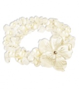 Prim petals. This pretty stretch bracelet combines three strands of cultured freshwater pearls (6-7 mm), white shells and cultured Mother of Pearl (46-3/4 mm) with a sweet flower accent. Set in sterling silver. Approximate length: 7-1/2 inches. Approximate diameter: 2 inches.