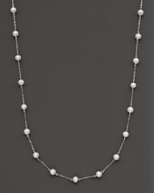 Beaded 14 Kt. white gold necklace with fresh water pearl stations.