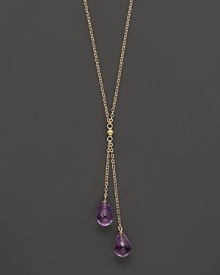 Twin amethyst briolettes sparkle from this 14K yellow gold lariat necklace.