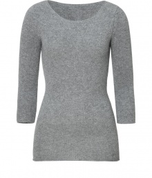 Update your cold weather look with this ultra-chic cashmere pullover from Dear Cashmere - Round neck, three-quarter sleeves, slim fit, long body - Pair with skinny jeans, embellished ballet flats, and a sleek parka