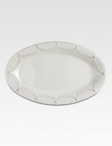 Juliska's signature thread and berry motif lends an elegant touch to this distinctive serving platter.Stoneware ceramicDishwasher safe22.5 X 14Imported