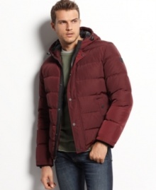 Bulk up on comfort, warmth and cool-weather style with this water and wind resistant puffer coat from Guess.