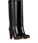 With their clean lines and sleek polished leather, Kors Michael Kors stacked heel tall boots as chic as they are versatile - Round toe, puffed seams, natural stacked leather blocky heel and micro platform - Knee height - Wear with everything from knit dresses and carryall totes to leather leggings and oversized cashmere pullovers