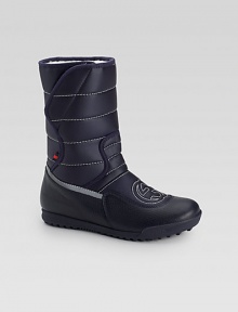 Unmistakeable GG stitching defines these waterproof nylon boots, accented with signature web detail.Grip-tape closureNylon upperFaux fur liningRubber solePadded insoleImported