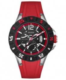 Bring some bold energy to your style with this masculine sport watch from GUESS.