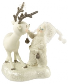 Crafted of pure porcelain bisque, this treasured figurine showcases a sweet Snowbaby and friendly fawn both with rosy cheeks and sparkling silver accents sure to bring a new holiday tradition to your home. From Department 56.