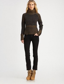 A chunky pullover in a variety of rich melange yarns has an intriguing tweedy effect.Ribbed turtleneck collarContrast shouldersSlightly tapered at the waist with logo tagLong sleeves with wide ribbed contrast cuffsWide ribbed subtly flared hemAbout 22 from shoulder to hemWool/nylon/silkDry cleanImportedSIZE & FITModel shown is 5'10½ (179cm) wearing US size Small. 