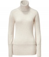 Luxe and stylish, this easy-to-wear cashmere pullover will elevate your cold weather staples - Ribbed turtleneck, long sleeves with long ribbed cuffs, slim fit, wide ribbed hem - Pair with skinny jeans, a pencil skirt, or cropped trousers