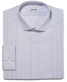 Fine lines. A subtle stripe and slim fit gives this Calvin Klein shirt an ultra-modern look.