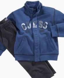 He'll be prepped for playtime in this adorable sweatshirt and pant set from GUESS?.