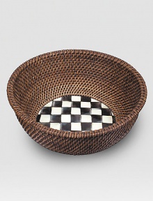 An inviting mix of handwoven, natural rattan and glazed enamelware, handpainted with high-contrast checks and subtle jeweltones. Enamelware backed in lightweight, lasting steel Bronzed stainless steel rim 5¾H X 12 diam. Imported