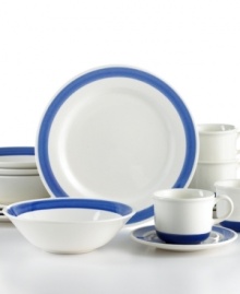 Made in the shade. Bands of cobalt blue contrast contemporary white dinnerware that, in dishwasher-safe earthenware, is easy to enjoy every day. From Corona.