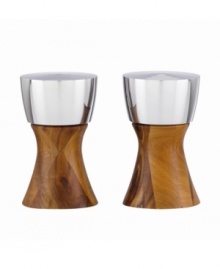 Less is more with Dansk wood serveware. The contemporary look and rich wood grain of Bergit salt and pepper shakers combine for endless casual appeal. Pepper shaker features metal top.