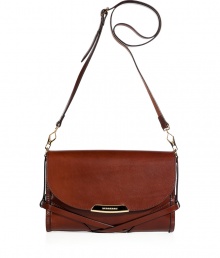 With equestrian-inspired strapping and sleek dark tan leather, Burberry Londons crossbody bag lends an ultra-sophisticated polish to your look - Flap with logo engraved plaque, removable buckled shoulder strap, check lining, inside zippered back wall pocket, front wall slot pockets - Wear with tailored outerwear or an iconic Burberry trench