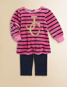 Crafted in plush velour, this stunning tunic features bold stripes and glimmering logo detail, paired with cozy leggings. Tunic Round necklineLong sleevesBack snaps Leggings Elastic waistbandCotton/Polyester/SpandexMachine washImported Please note: Number of snaps may vary depending on size ordered. 