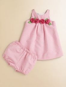 Roses and stripes adorn the bodice and back of this most-loved knit set with matching bloomers.Round necklineSleevelessBack zipper with keyhole openingElastic waist and leg openings65% polyester/35% cottonMachine washImported