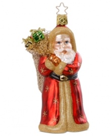 Special delivery! This Inge-Glas ornament features Santa with a sack full of gifts on his back. Mouth-blown and hand-painted for expert craftsmanship.