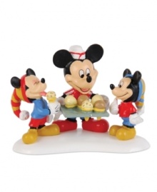 It's never too cold in Mickey's Village for some yummy ice cream cones. Two little mice enjoy the sweet treat in this cute figurine from Department 56.