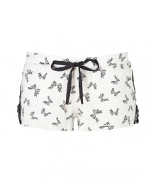 Incredibly comfy and equally sexy, Juicy Coutures lace detailed bow print shorts are a sweet choice for everyday lounging - Drawstring waistband with black tie and gold-toned heart aglets, black side lace inserts with button detail, slit leg - Form-fitting, extra short - Wear with cozy shearling slippers and the matching cami