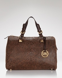 Richly crafted with signature details, this MICHAEL Michael Kors satchel flaunts effortless glamor on-duty or off.