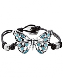 A naturally beauty. The intricate silver tone openwork butterfly decoration on this mixed metal Fossil bracelet really stands out against the chocolate leather cord wrist wrap. Semi-precious turquoise stones add a pretty dose of color. Approximate length: 7-3/4 inches.