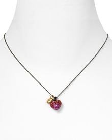 Make Juicy Couture's vibrant pavé heart necklace your go-to piece for playful glamour.