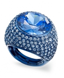 Pop some bubbly with this shimmering cocktail ring from Juicy Couture. The bubbled design sparkles with blue-colored glass accents. Crafted in silver tone mixed metal. Stretches to fit finger. Approximate width: 1 inch.