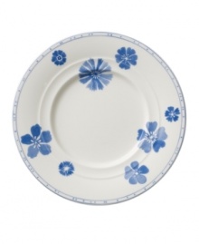 Vintage charm meets modern durability in the Farmhouse Touch bread and butter plates, featuring cornflower-blue florals and bands in premium porcelain from Villeroy & Boch.