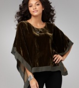 A velvet poncho is the chicest way to dress for the holidays! Cha Cha Vente's softly-draped, sumptuous top elevates everything from jeans to your dressiest trousers. (Clearance)