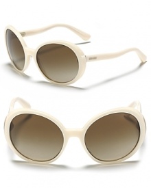 Thick rounded sunglasses add a chic accent to your favorite ensemble.