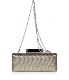 Hard-edge elegance gets an impossibly glamorous twist in Diane von Furstenbergs metallic twill clutch, finished to perfection with a flawless patent leather back - Metal frame, hinged top closure, removable chain-link shoulder-strap, inside back wall slot pocket - Pair with cocktail dresses and statement pumps