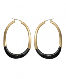 Hoops with an edge. Kenneth Cole New York takes oblong gold-plated mixed metal hoops and wraps black leather around the bottom. Approximate drop: 1-1/2 inches.