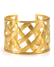 Kenneth Jay Lane's gleaming 22 karat gold plated brass basket weave cuff makes a chic statement.