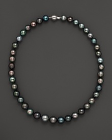 Darkly shimmering Tahitian pearls with 14K. white gold.