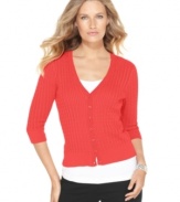 A classic cardigan gets a cute new look from Eight Eight Eight! A micro-cable knit and a cropped, fitted silhouette make this sweater a unique addition to your closet.