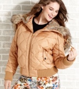 Score a luxe look for less with Baby Phat's plus size quilted puffer jacket, featuring a faux fur hood.