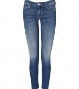 The ultimate must-have, these luxe jeans from It denim brand Mother are the favorite skinnies of the fashion flock - Classic five-pocket styling, stylishly faded denim, ankle length, skinny leg - Style with an oversized cashmere pullover, a wool cape, and platform booties