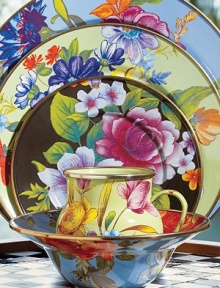 A vibrant bouquet of flowers blossoms on an enameled steel charger, hand decorated to create the ideal touch of color on a summertime table. From the Flower Market Collection Front and back design Bronzed stainless steel rim 12 diam. Dishwasher safe Imported 